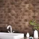 A bathroom wall close-up of a Subway Wall Tile TL 06427 AA Eterna Cocoa Classic Sepia 12 x 4 inch Ceramic Glossy Finish - 8 mm | 24 Random Design | Suitable for Accent / Feature Walls, Bathroom, Kitchen Wall & Backsplashes with a Glossy finish available at Material Depot in Bangalore