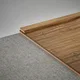 A close-up of a MDF Corner Beading Profile Vitality TF 00587 B | 8 ft x 18 mm x 12 mm | Compatible for Laminate Wood Floor LF 00352 F available at Material Depot in Bangalore