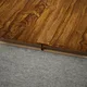 A close-up of a MDF T Profile Vitality TF 00587 N | 8 ft x 16 mm x 12 mm | Compatible for Laminate Wood Floor LF 00352 F available at Material Depot in Bangalore