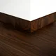 A close-up of a MDF Skirting Aristo PM 00356 G | 8 ft x 4 Inch | Compatible for Laminate Wood Floor LF 00243 available at Material Depot in Bangalore