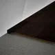 A close-up of a MDF Reducer R Profile Aristo Premium PM 00371 J | 8 ft x 18 mm x 12 mm | Compatible for Laminate Wood Floor LF 00251 available at Material Depot in Bangalore