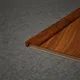 A close-up of a MDF L Nosing Profile Aristo Premium PM 00371 W | 8 ft x 25 x 25 x 12 mm | Compatible for Laminate Wood Floor LF 00251 available at Material Depot in Bangalore
