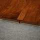 A close-up of a MDF T Profile Aristo Premium PM 00366 P | 8 ft x 23 mm x 12 mm | Compatible for Laminate Wood Floor LF 00252 available at Material Depot in Bangalore