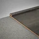 A close-up of a MDF Corner Beading Profile Aristo Premium PM 00372 C | 8 ft x 25 mm x 12 mm | Compatible for Laminate Wood Floor LF 00253 available at Material Depot in Bangalore
