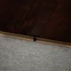 A close-up of a MDF T Profile Aristo Premium PM 00355 M | 8 ft x 12 mm x 12 mm | Compatible for Laminate Wood Floor LF 00254 available at Material Depot in Bangalore
