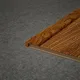 A close-up of a MDF L Nosing Profile Heirloom PM 00354 W | 8 ft x 25 x 25 x 12 mm | Compatible for Laminate Wood Floor LF 00272 available at Material Depot in Bangalore