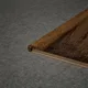 A close-up of a MDF L Nosing Profile Edge Flow PM 00382 X | 8 ft x 25 x 45 x 12 mm | Compatible for Laminate Wood Floor LF 00273 available at Material Depot in Bangalore