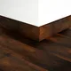 A close-up of a MDF Skirting Edge Flow PM 00381 D | 8 ft x 2.5 Inch | Compatible for Laminate Wood Floor LF 00274 available at Material Depot in Bangalore