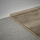 A close-up of a MDF Corner Beading Profile Timberlux PM 00373 B | 8 ft x 18 mm x 12 mm | Compatible for Laminate Wood Floor LF 00277 available at Material Depot in Bangalore