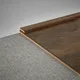 A close-up of a MDF Corner Beading Profile Timberlux PM 00375 C | 8 ft x 25 mm x 12 mm | Compatible for Laminate Wood Floor LF 00279 available at Material Depot in Bangalore