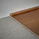 A close-up of a MDF Corner Beading Profile Aqua Lock PM 00401 B | 8 ft x 18 mm x 12 mm | Compatible for Laminate Wood Floor LF 00284 available at Material Depot in Bangalore