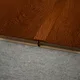 A close-up of a MDF T Profile Aqua Lock PM 00401 O | 8 ft x 18 mm x 12 mm | Compatible for Laminate Wood Floor LF 00284 available at Material Depot in Bangalore