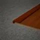 A close-up of a MDF L Nosing Profile Aqua Lock PM 00403 W | 8 ft x 25 x 25 x 12 mm | Compatible for Laminate Wood Floor LF 00286 available at Material Depot in Bangalore