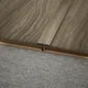 A close-up of a MDF T Profile Aqua Lock PM 00404 N | 8 ft x 16 mm x 12 mm | Compatible for Laminate Wood Floor LF 00287 available at Material Depot in Bangalore