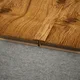 A close-up of a MDF T Profile Aqua Lock PM 00405 N | 8 ft x 16 mm x 12 mm | Compatible for Laminate Wood Floor LF 00288 available at Material Depot in Bangalore