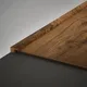 A close-up of a MDF Edge Profile Aqua Lock PM 00405 S | 8 ft x 16 mm x 12 mm | Compatible for Laminate Wood Floor LF 00288 available at Material Depot in Bangalore