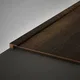 A close-up of a MDF Edge Profile Aqua Lock PM 00406 S | 8 ft x 16 mm x 12 mm | Compatible for Laminate Wood Floor LF 00289 available at Material Depot in Bangalore