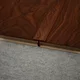 A close-up of a MDF T Profile Aqua Lock PM 00409 N | 8 ft x 16 mm x 12 mm | Compatible for Laminate Wood Floor LF 00292 available at Material Depot in Bangalore