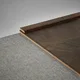 A close-up of a MDF Corner Beading Profile Herringbone PM 00396 | 8 ft x 12 mm x 12 mm | Compatible for Laminate Wood Floor LF 00297 available at Material Depot in Bangalore