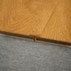 A close-up of a MDF T Profile Herringbone PM 00398 M | 8 ft x 12 mm x 12 mm | Compatible for Laminate Wood Floor LF 00298 available at Material Depot in Bangalore
