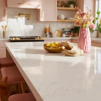 Modern dual tone kitchen with glossy brown and white laminate, quartz countertop, and yellow geometric backsplash tile
