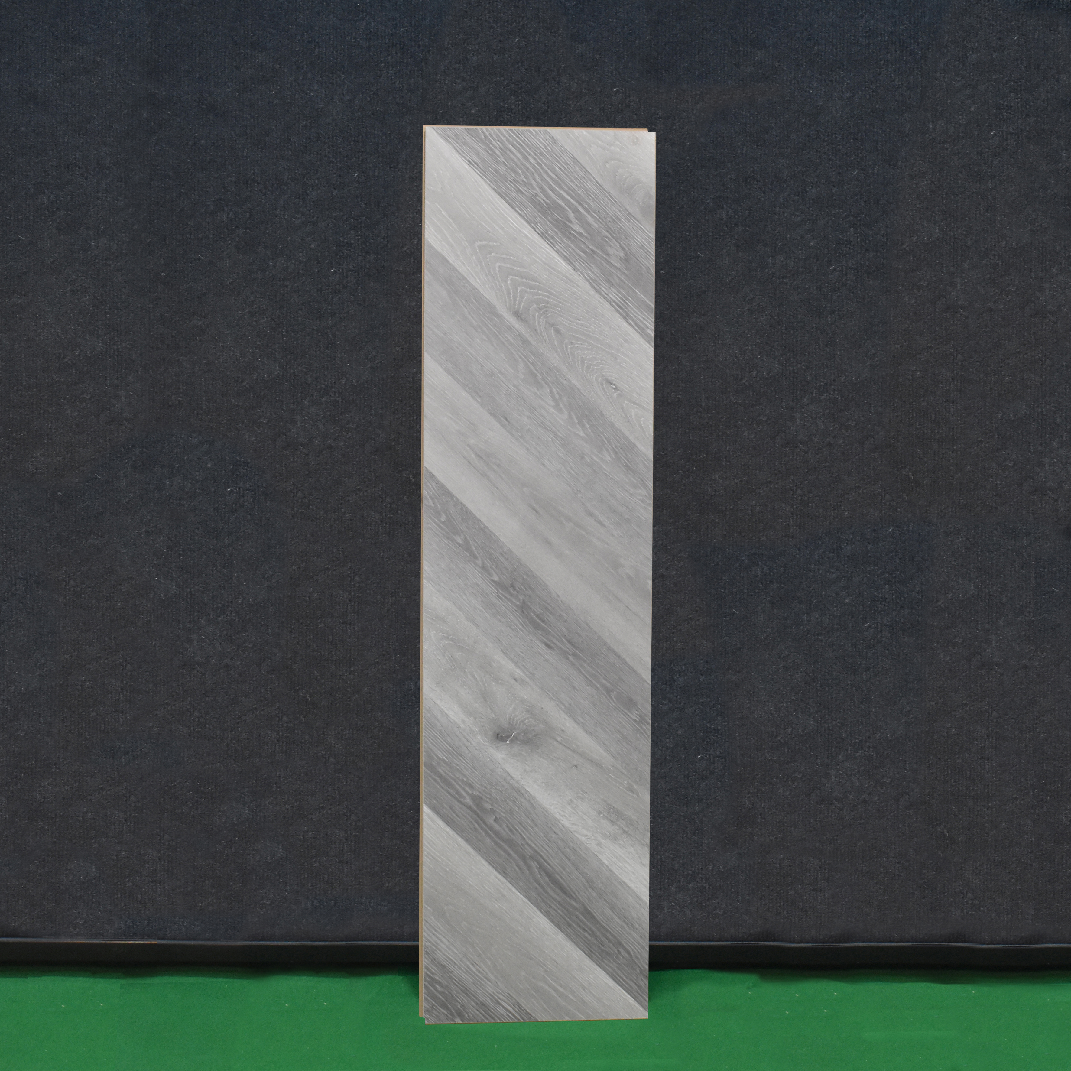 HDF Fish Bone Laminate Wood Floor AC5 Class 33 Grade Chevron Ash Oak Noir LF 00302 48 x 12 inch (1220x300 mm) - 8 mm | Natural Wood Grain Surface | V Groove | Unilin Click Locking System Unilin Click Locking System with Moisture Resistant Yellow Backing | European Designs | 12-15 Years Warranty