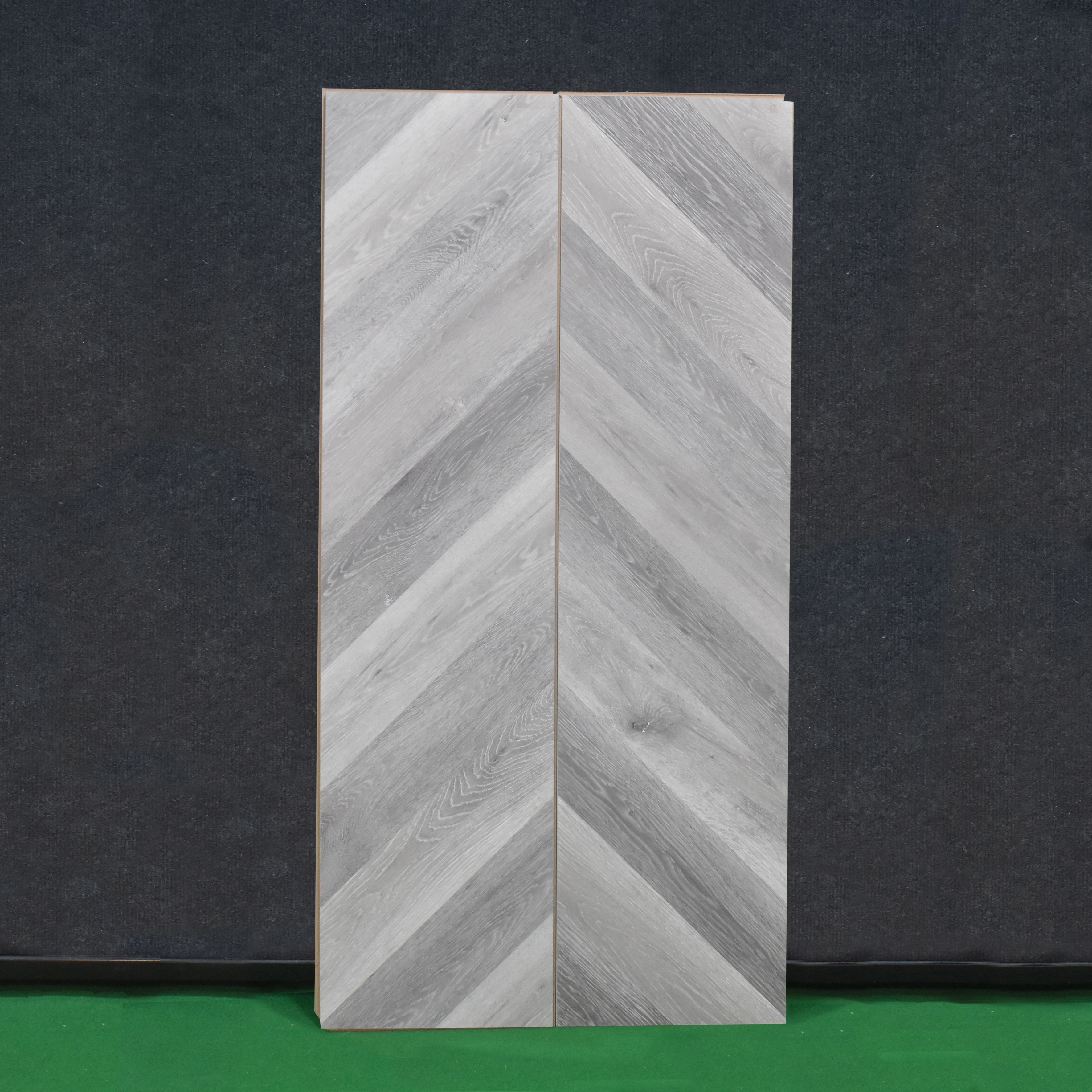 HDF Fish Bone Laminate Wood Floor AC5 Class 33 Grade Chevron Ash Oak Noir LF 00302 48 x 12 inch (1220x300 mm) - 8 mm | Natural Wood Grain Surface | V Groove | Unilin Click Locking System Unilin Click Locking System with Moisture Resistant Yellow Backing | European Designs | 12-15 Years Warranty