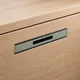 HA 00198 Q Ottr Concealed Handle Green Black Finish 12in â close-up of sage green handle on oak drawer
