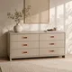 HA 00198 G Ottr Concealed Handle Rgtt Finish 12in â copper handles on grey chest of drawers