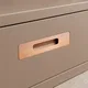 HA 00200 J Ottr Concealed Handle Rose Gold Finish 36in â close-up of copper handle on taupe drawer