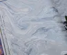 A close-up of a888037 | 10 Meter x 21 Inches Marble Look Wallpaper - 57 Sq. Ft. available at Material Depot in Bangalore
