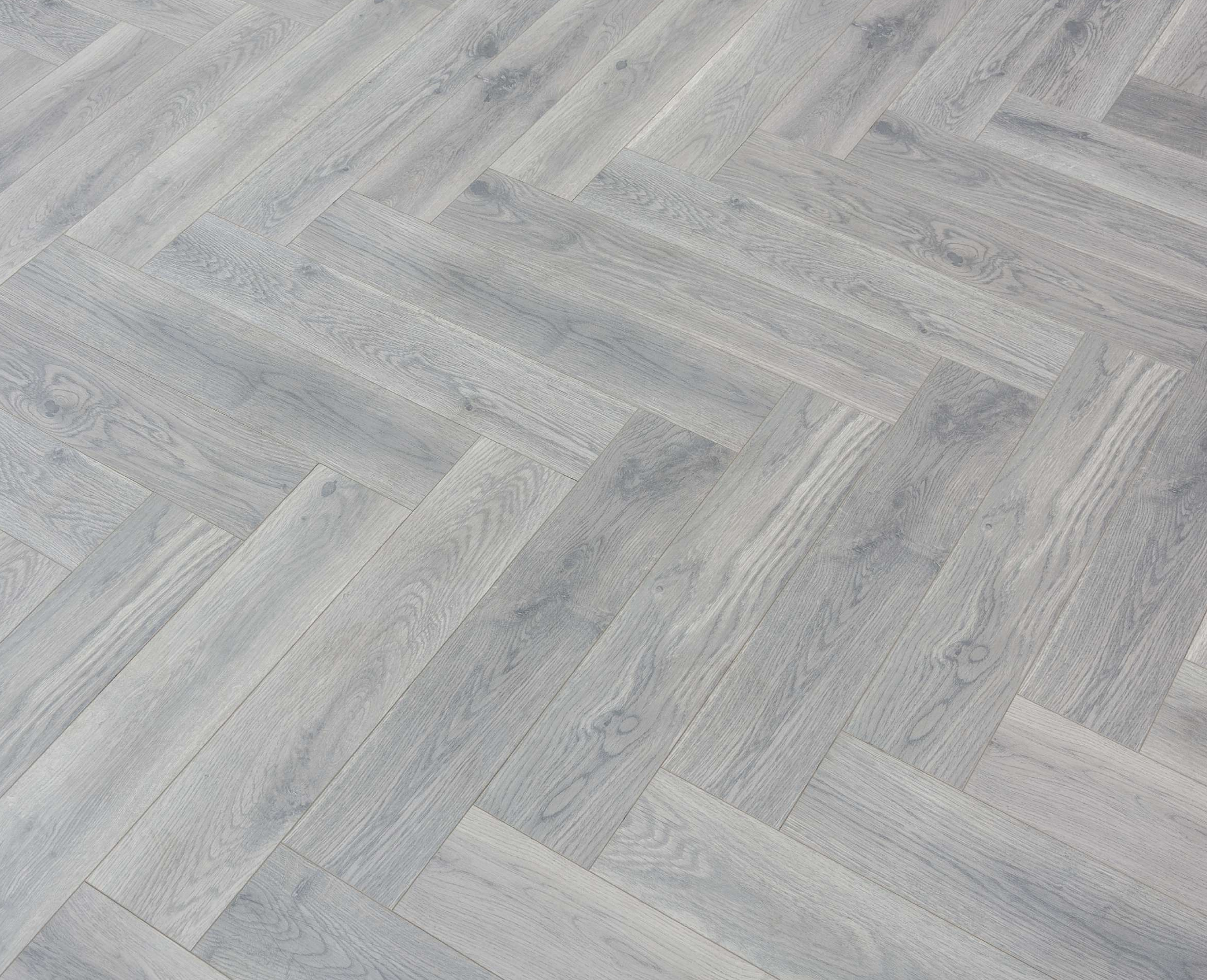 HDF Herringbone Real Wood Matte Surface Laminate Wood Floor AC5 Grade LF 00336 E Beaconia Matt Grey Oak 19 x 4 inch (470x95 mm) - 12 mm | Aqua Protect 12 Hours Water Resistance | Anti Static and Stain Resistant | 0.5 mm V Groove | Real Wood Touch Surface | Uniclic Installation | 36 Plank Variations | 25 Years Warranty