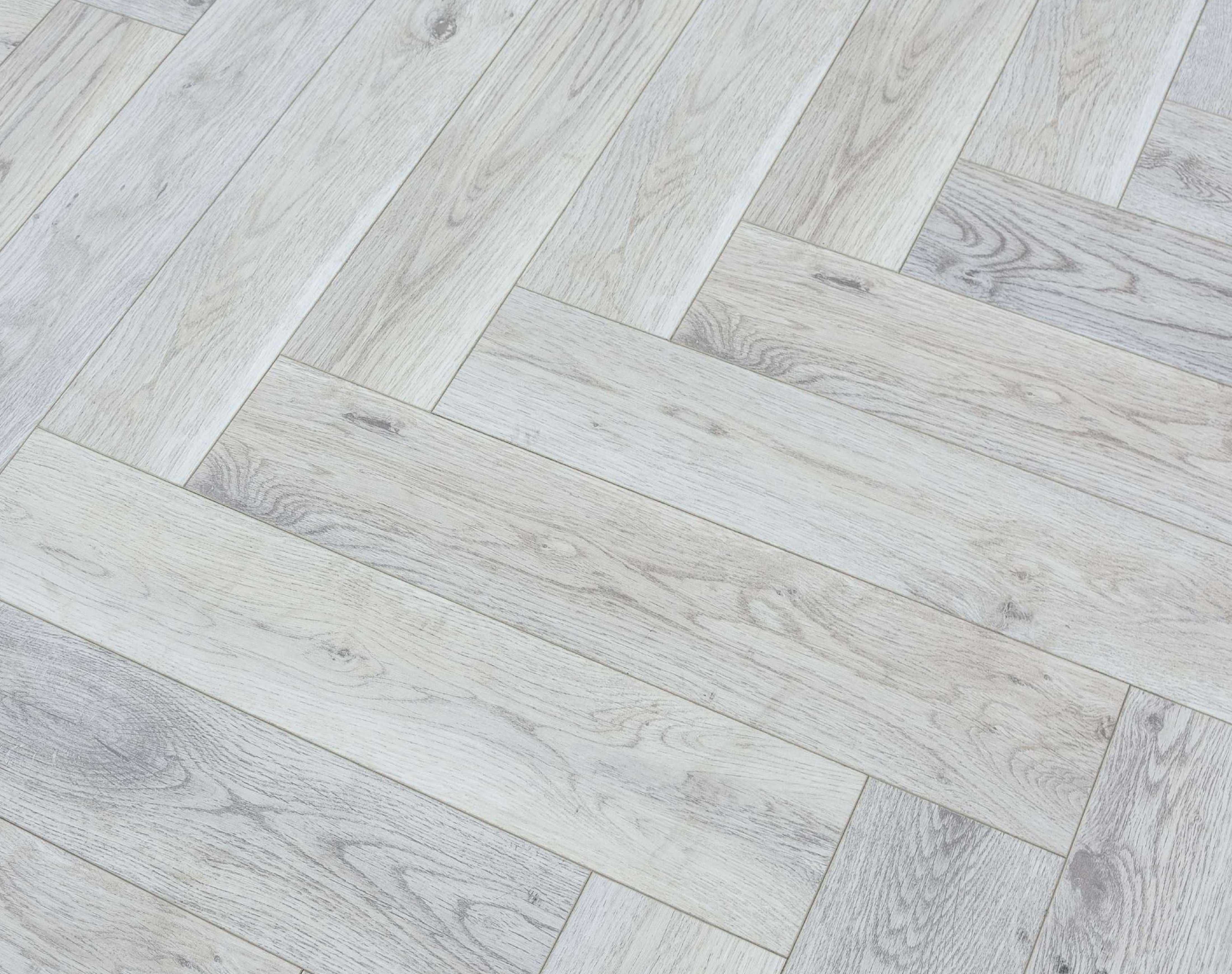 HDF Herringbone Real Wood Matte Surface Laminate Wood Floor AC5 Grade LF 00336 B Beaconia White Washed Oak 19 x 4 inch (470x95 mm) - 12 mm | Aqua Protect 12 Hours Water Resistance | Anti Static and Stain Resistant | 0.5 mm V Groove | Real Wood Touch Surface | Uniclic Installation | 36 Plank Variations | 25 Years Warranty