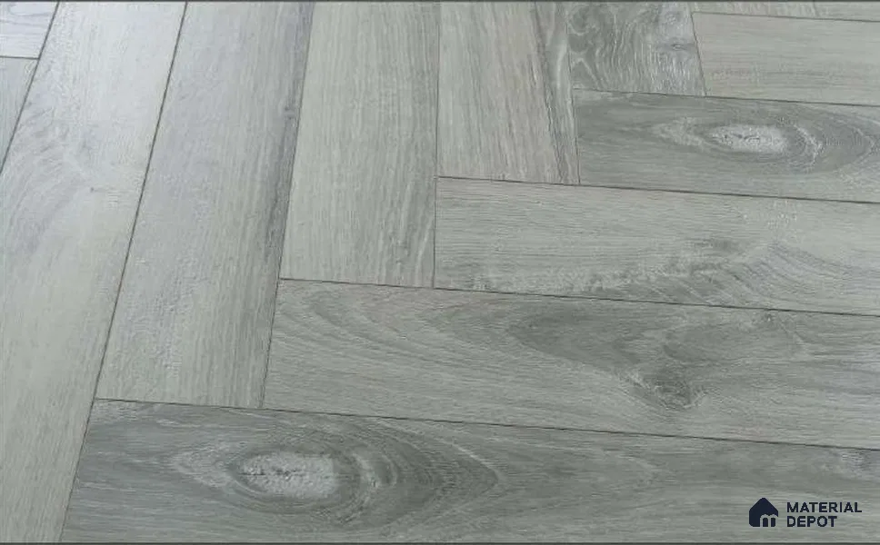 HDF Herringbone Real Wood Matte Surface Laminate Wood Floor AC5 Grade LF 00338 B Beaconia Cemento Spa 19 x 4 inch (470x95 mm) - 12 mm | Aqua Protect 12 Hours Water Resistance | Anti Static and Stain Resistant | 0.5 mm V Groove | Real Wood Touch Surface | Uniclic Installation | 36 Plank Variations | 20 Years Warranty