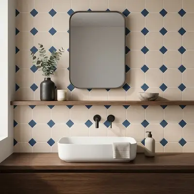 Modern kitchen walkthrough with beige and blue geometric backsplash tile, white marble countertop, and walnut wood laminate cabinets