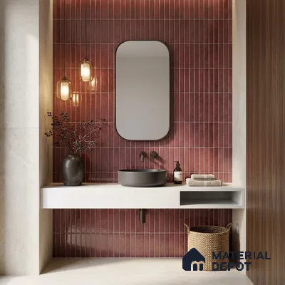 Modern bathroom with burgundy kitkat wall tiles and white quartz floating vanity