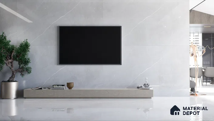 Minimalist living room with large TV and low console | Material Depot