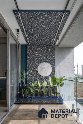 Modern balcony with terrazzo wall and ceiling panels, glass railing, and rustic floor tiles