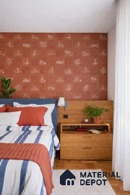 Eclectic bedroom with terracotta Warli art tiles accent wall and natural wood furniture