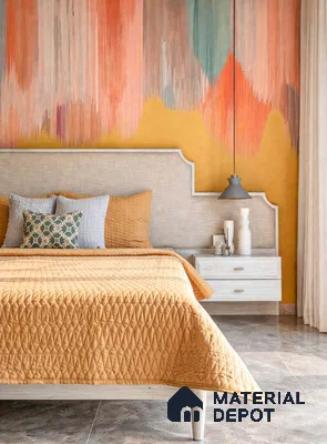 Eclectic bedroom with abstract multicolor wallpaper, beige upholstered headboard, and mustard bedding