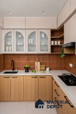 Modern kitchen with terracotta vertical subway backsplash tile, white quartz countertop, and light oak wood laminate cabinets