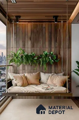 Modern balcony with natural wood wall cladding and beige cushioned swing seating in Alpine ECO Doddanekundi 3 BHK apartment Bengaluru