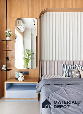Modern bedroom with light wood laminate, fluted white wall panels, and pastel blue bedside unit in Alpine ECO Doddanekundi 3 BHK apartment Bengaluru