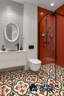 Modern bathroom with terracotta vertical subway wall tiles and floral patterned floor tiles of 3 BHK apartment in Alpine Fiesta Whitefield Bengaluru