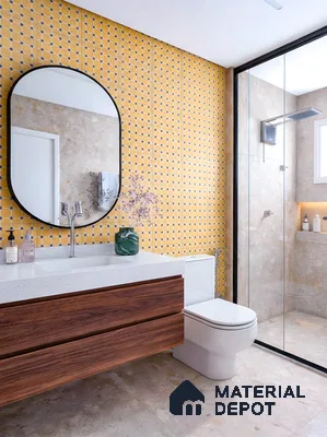Modern bathroom with yellow geometric wall tiles, white quartz countertop, and walnut wood vanity