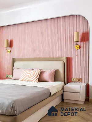 Modern bedroom with blush pink fluted wall panels and herringbone wooden flooring of 4 BHK apartment in Aparna Elina Yeshwanthpur in Bengaluru