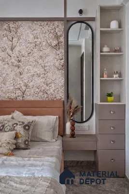 Modern bedroom with floral wallpaper, suede upholstered bed, and taupe laminate dresser