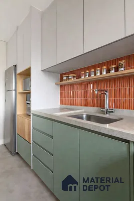 Modern kitchen with sage green laminate, terracotta kitkat backsplash tile, and light grey quartz countertop