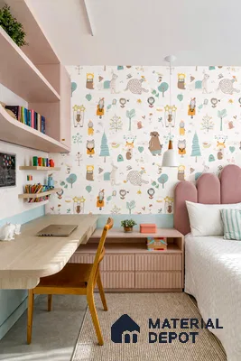 Scandinavian kids room with pastel animal print wallpaper, blush pink laminate storage, and light wood study desk