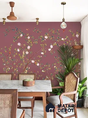 Eclectic dining room with chinoiserie floral wallpaper, marble tabletop, and cane wood chairs